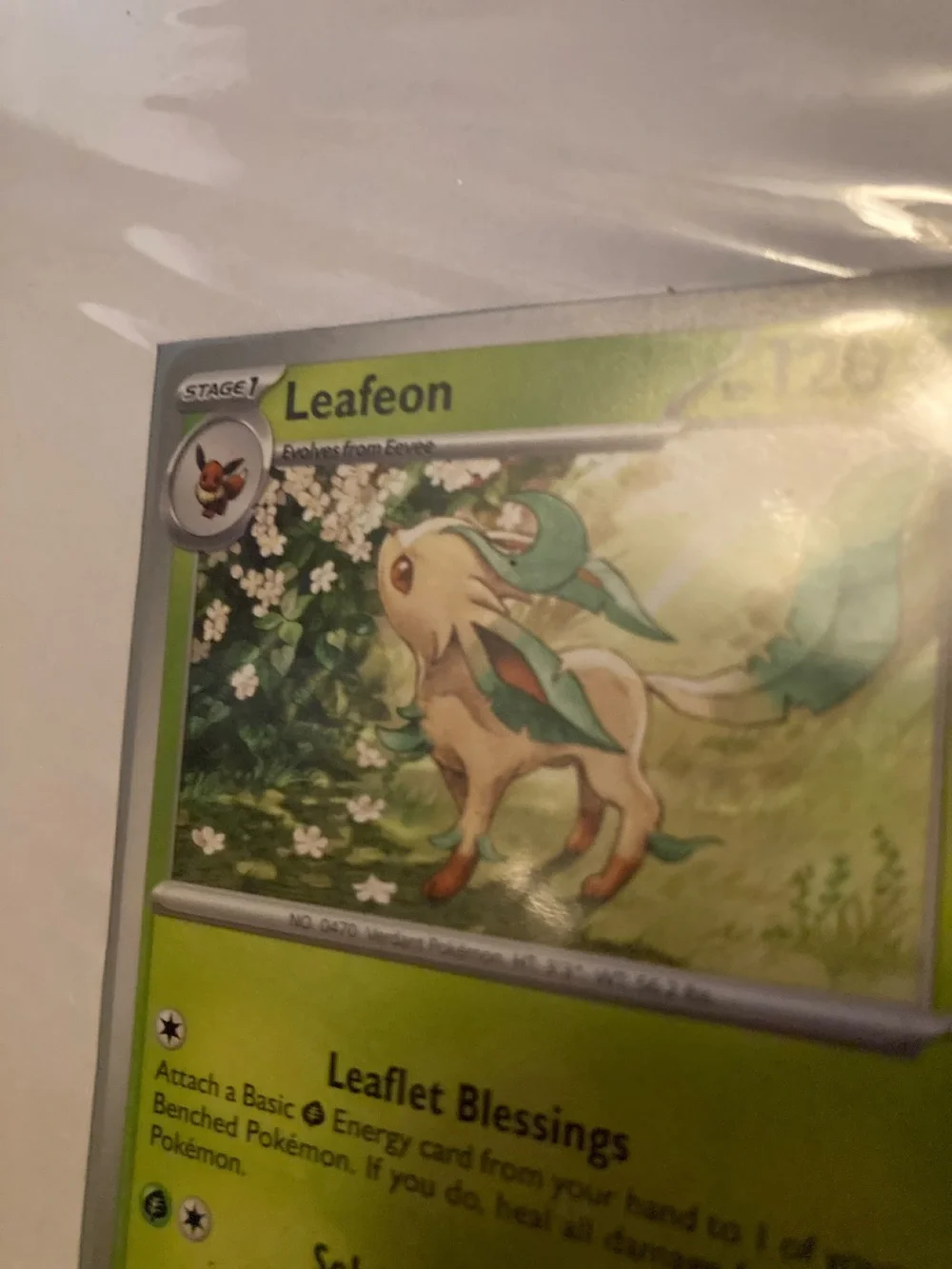 Pokemon Leafeon Green Trading Card and sleeve
